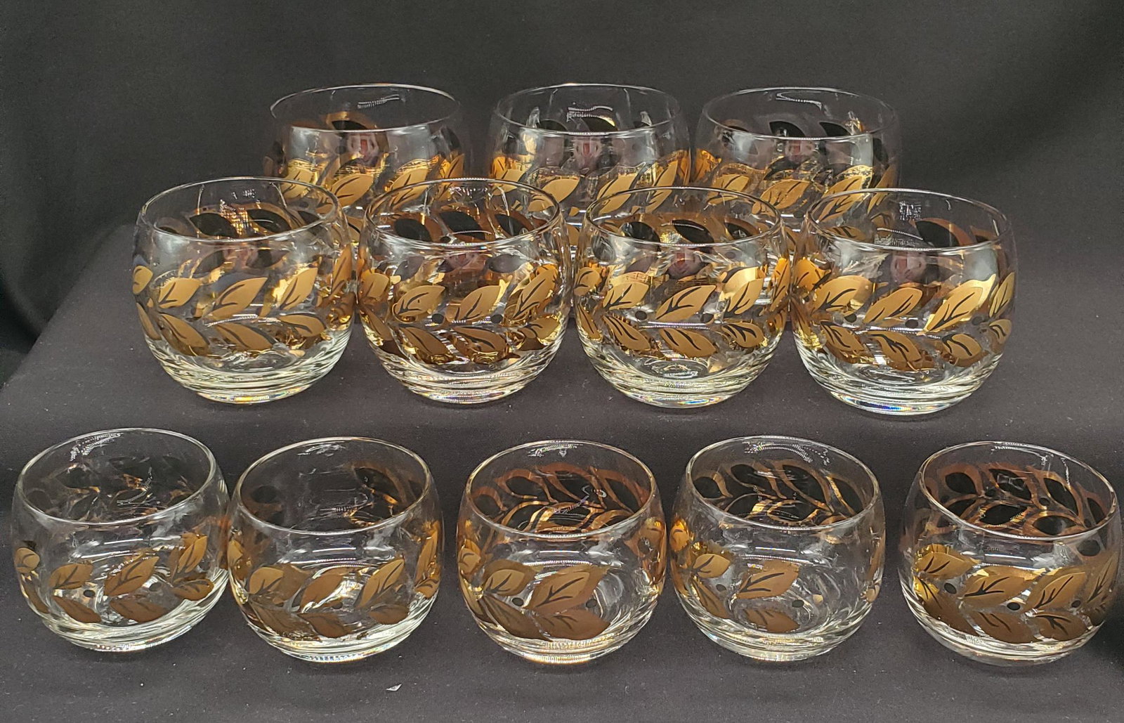 Roly Poly Glasses with gold leaf: Set of 12 Roly Poly Glasses with 22kt Leaf and Black Design, 3 different sizes