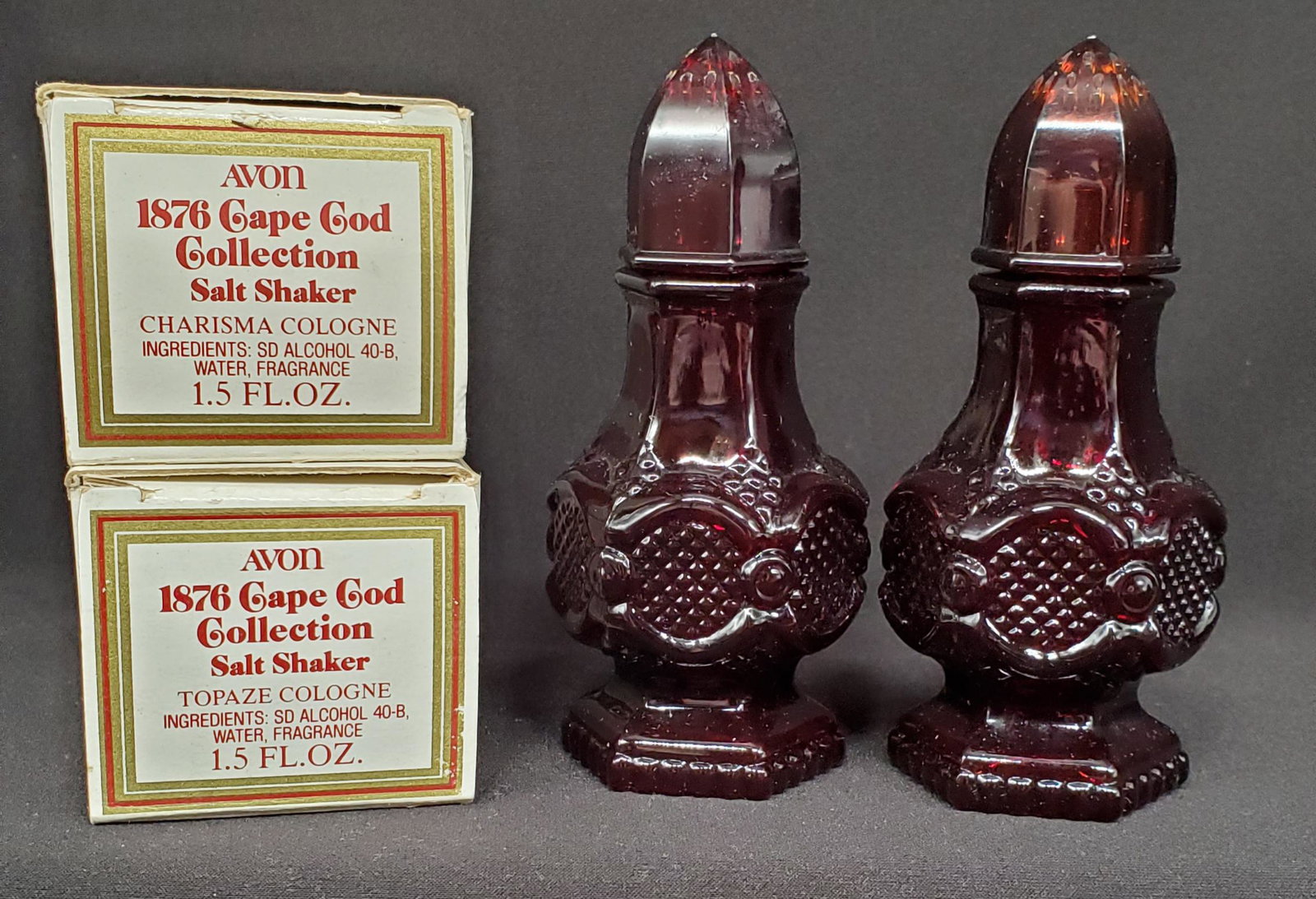 Vintage Ruby Red glass salt and pepper shaker set: Set of Vintage Ruby Red Glass salt and peppers by Avon