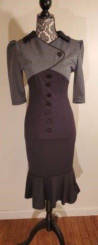 Chic Rockabilly Secretaries Dress: Classic vintage style with a modern twist. Made of stretch materials they most closely resembles an 8/10 size. 3 quarter length sleeve and ruffle details at the knee. Buttons are faux and dress unzips