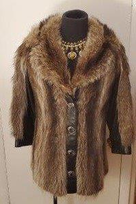 Raccoon and black leather coat by Kramer's: Kramer's - New Haven, Exquisite bespoke racoon and leather coat. Black interior with optional belt stop. 3/4 sleeve, 31inch length, small, uniquely gorgeous fur coat