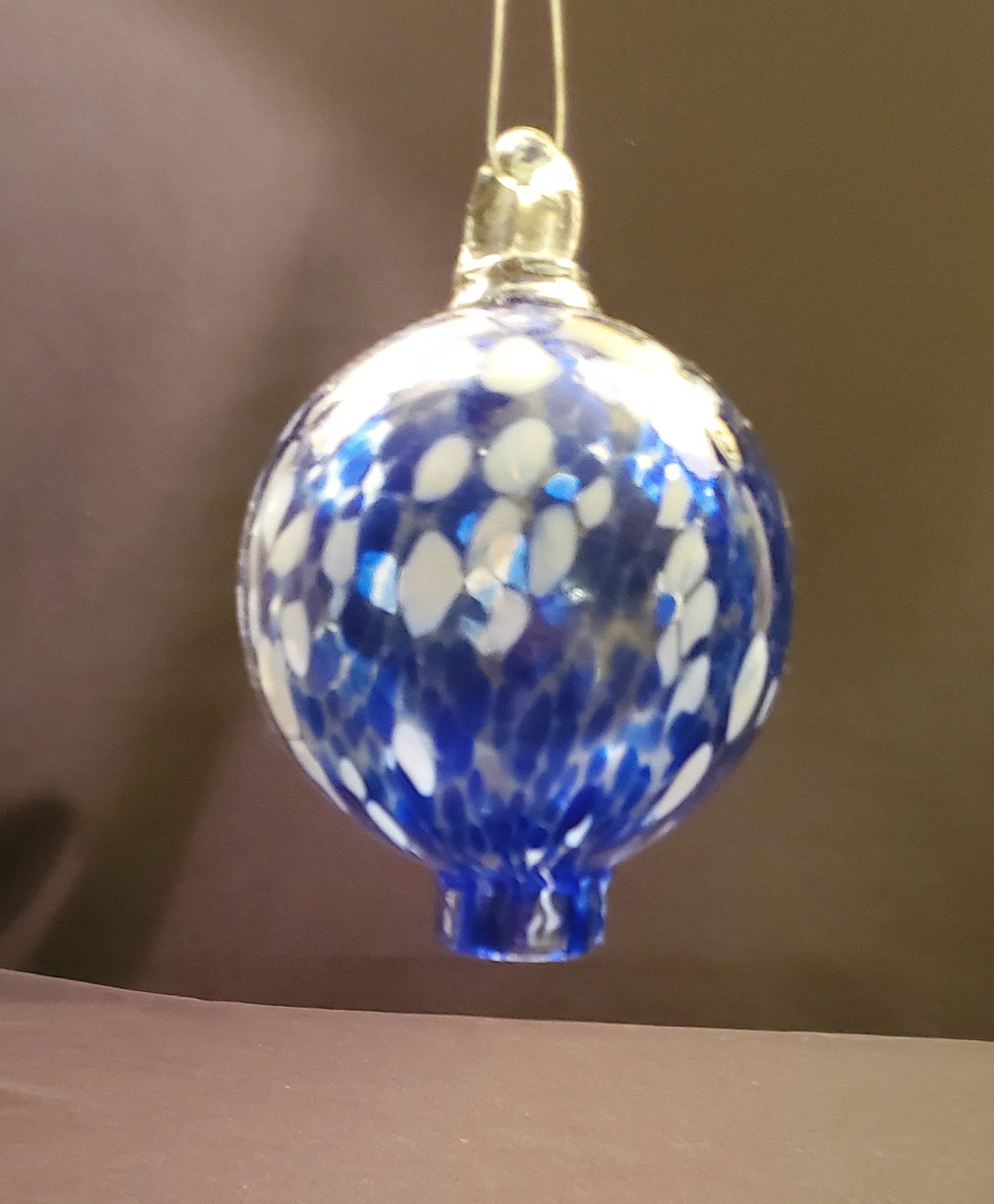 Blue & Green 4 Inch Kugel Glass Ball: This kugel is blue and green like the Caribbean Sea. The size is approximately 4" diameter. This was Hand BlownSometimethese balls are called Friendship Balls