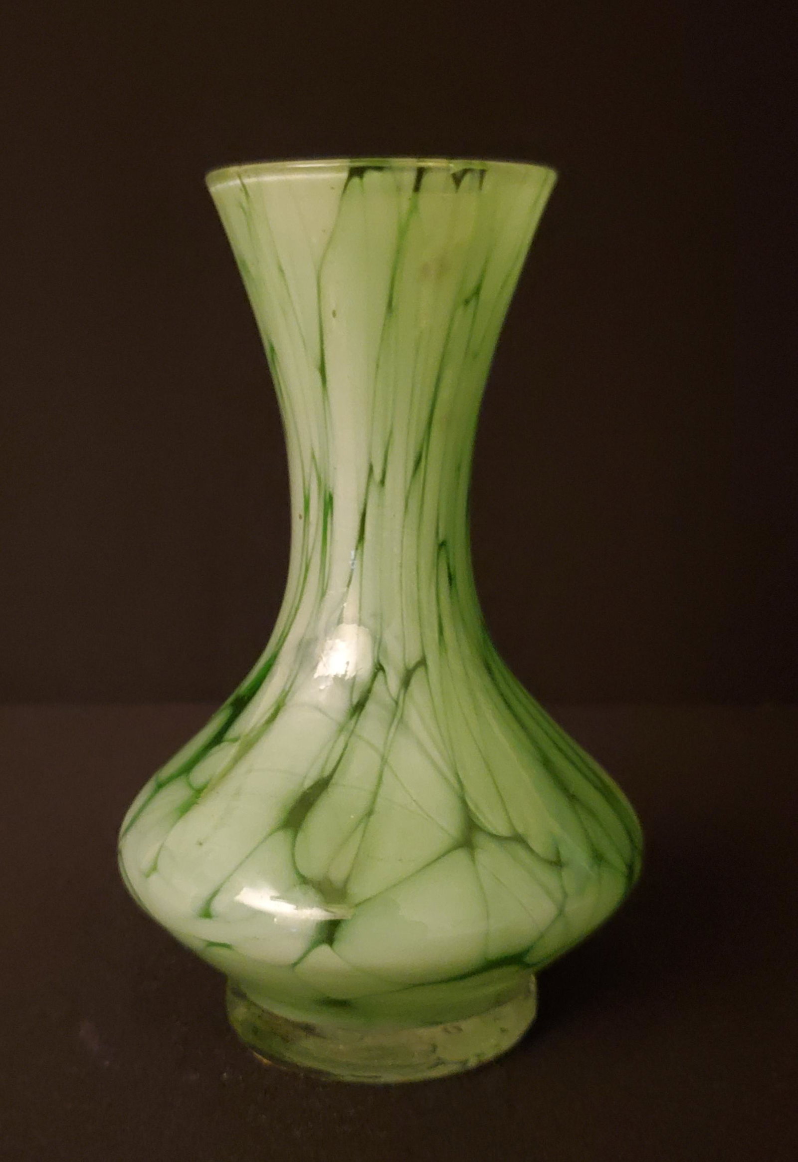Hand Blown Green and Clear Glass Bud Vase: 5.5" tall with 2" opening and 2" base; this cute but simple vase will look great on a desk or nightstand.