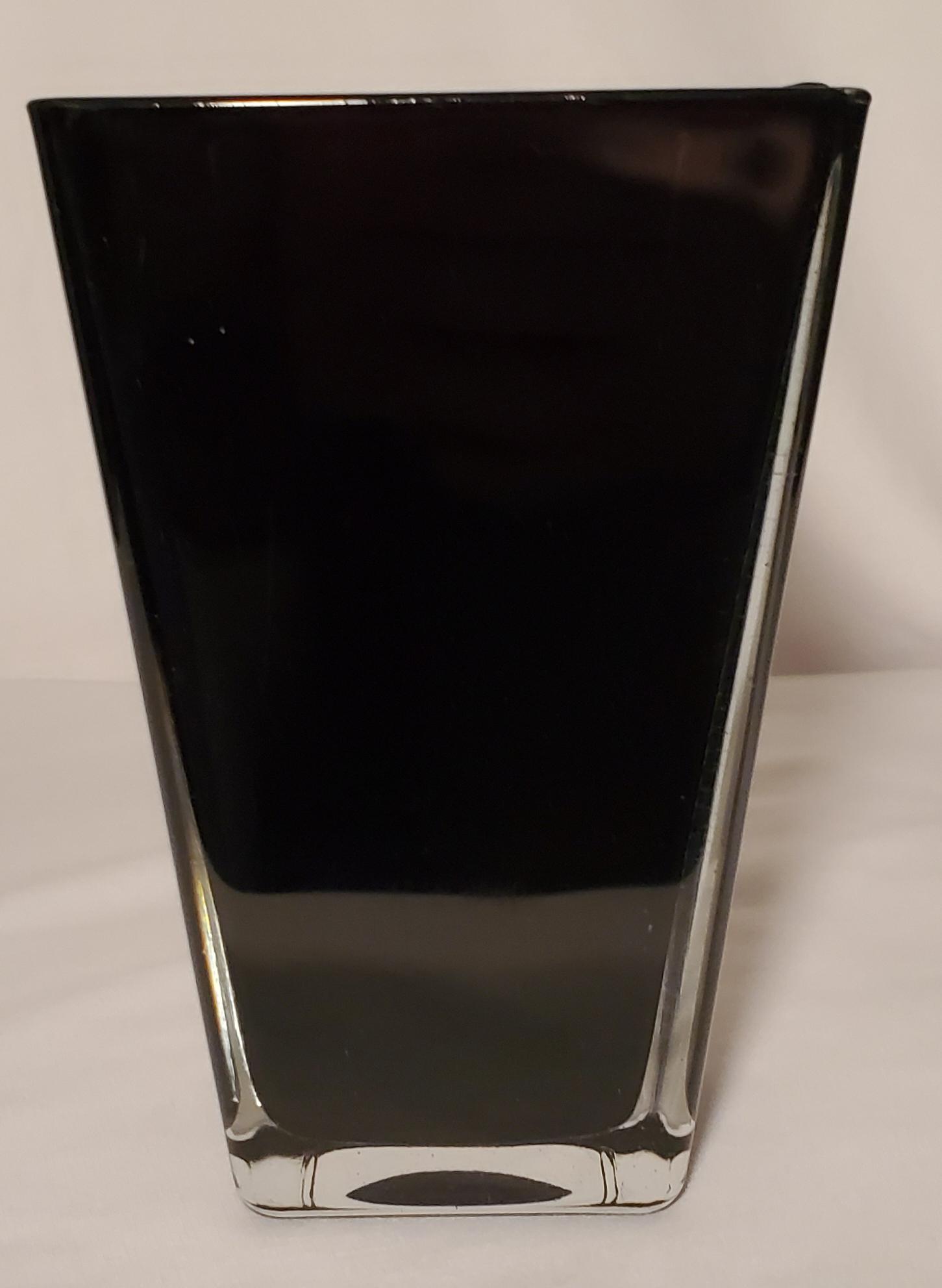 Black with Clear Case Square Glass Vase: Really useful vase for contemporary designs. Chunky and versatile. Simple and stylish arrangements can be created with very few flowers. 7" tall by 4.5" on the top and 3" base