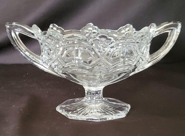 Vintage Pressed Glass Compote Bowl /Handles: Vintage Pressed Glass Compote Bowl with Trophy HandlesThis would be great for flowers 5.5" tall and 9" long