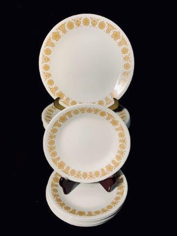 Grouping of 16 vintage Corelle butterfly gold plates: The iconic Corelle butterfly gold pattern by Corning (discontinued) was introduced in 1970 and has become one of the most collected patterns of Corelle. This grouping includes 8 dinner plates and 8 br