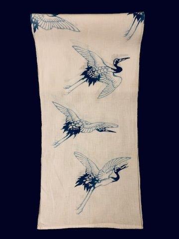 White woven table runner with crane design (1 of 1)