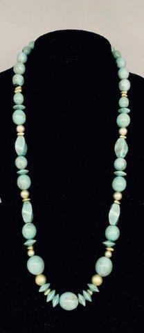 Turquoise Tone Wooden Bead Necklace: Artistic Multi shaped beads in tones of turquoise, made of wood