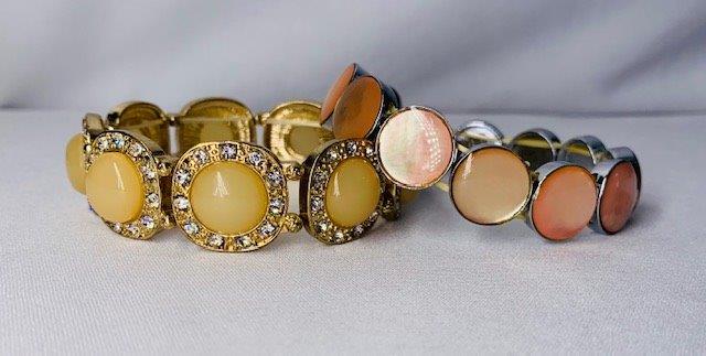Pair of complimentary Bracelets: Beautiful mother of pearl and one opaque off white alabaster type stone