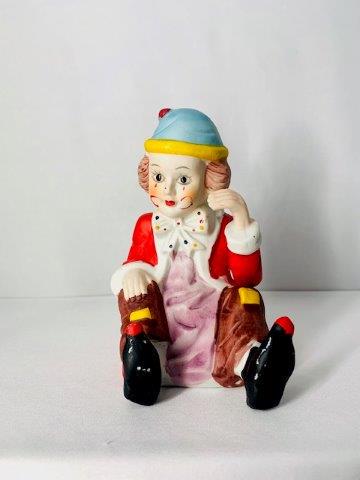 Ceramic Mid Century Clown: Here again begs the age old question: cute or creepy? This adorable ceramic clown statue is only 6 inches tall, which means he can't hide in your bedroom closet and reach the door handle too