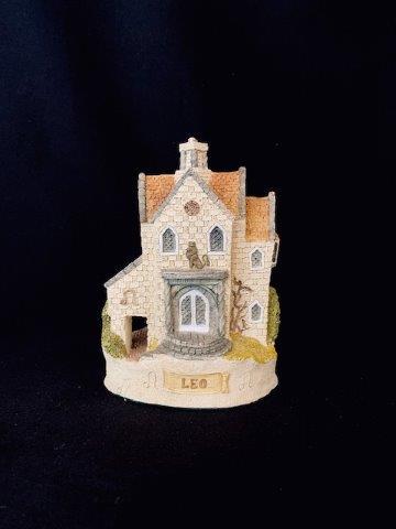 Leo Cottage by John Hine: Hand made and Hand Painted, Made in Wales.Â 1987, 5.5 inches tall. Excellent Condition.Â Â Various Items sold AS IS.Â Some items may haver slight imperfections that are barely noticeable.Â