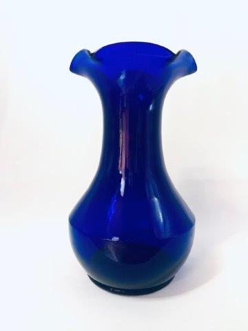 Cobalt Blue Ribbon Tap Vase: Rich in color, this cobalt blue glass vase standing 9.75 inches tall, 4 inches wide at base and 5 inches wide at top