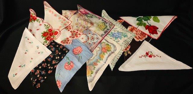 Collection of 14 vintage handkerchiefs: Beautiful assortment of 14 ladies handkerchiefs with floral motif.Â Various sizes in fabrics including multiple patterns and detailed edging