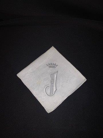 Single embroidered initial F handkerchief: Beautiful white handkerchief with large elegant cursive F on the corner measuring 13 x 13. Â