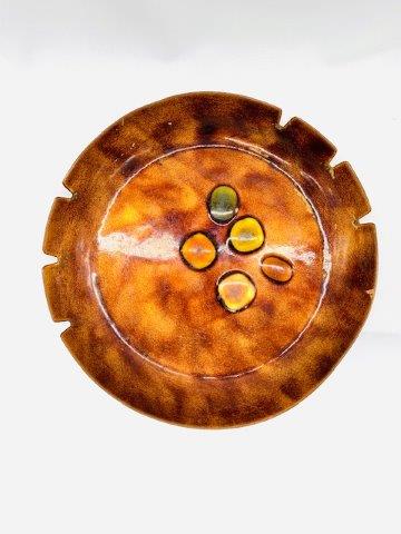 Vintage Enamel on Copper Ashtray: Iconic mid-century modern style with this enamel on copper ashtray.