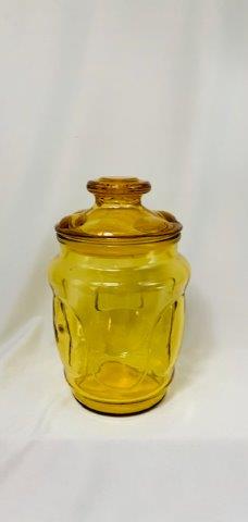Vintage Amber Glass Canister: This beautiful light amber glass container is 8.5 inches tall and 5 inches wide.