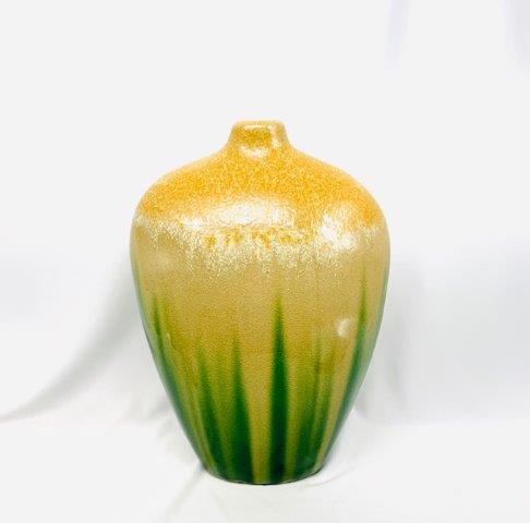 Potter Jug with Ombre Color Tones: Beautiful __ inch jug style vase with ombre earth tones that fade from sandy tan to green.