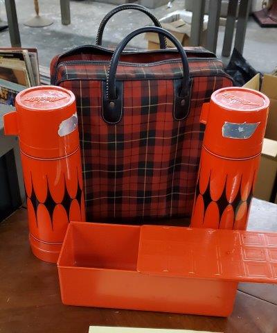 Vintage Aladdin Thermos Bottle And Bag Set, Plaid: Vintage Aladdin Thermos Bottle And Bag Set, Plaid. Condition is used. In fantastic shape. It contains 2 bottles with caps and cups intact. There is also a rectangular storage box. The bag is near mint