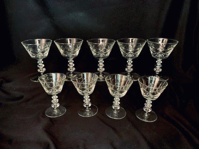 Nine Sculptural Pieces of Stemware: Geometric design, five wine glasses (5 1/2 inches) and four cordials(4 1/2 inches).