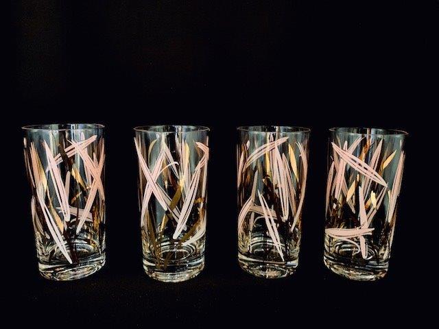 MCM Fred Press Tumbler set (set1): Gorgeous set of four tumblers signed by Fred press. These iconic mid century glam barware tumblers stand 5 3/4 inches tall in matches lot # 77