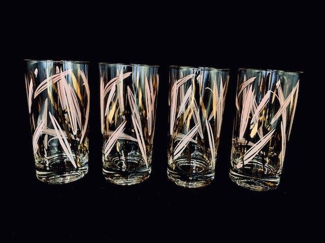 MCM Fred Press Tumbler set (set2): Gorgeous set of four tumblers signed by Fred press. These iconic mid century glam barware tumblers stand 5 3/4 inches tall in matches lot # 76