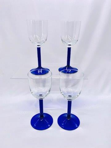 Four Cobalt Stem Wine Glasses: Deep cobalt blue stemmed set of four wine glasses with wide base and clear goblet standing 6 3/4 inches tall.