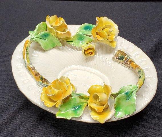 Capodimonte Porcelain Dish Made in Italy: Capodimonte Porcelain Hand Made Yellow Flowers which is hand made and signed on Bottom Made in Italy 8" x 6" Oval