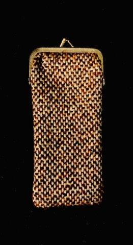 Vintage Tweed Eyeglass Case: Vintage tweed eyeglass cases measuring 6 1/2 x 2 3/4 with snap closure and original eye Dr. label on the inside