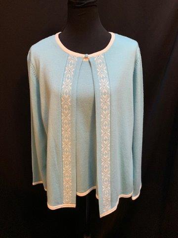 Single Piece Sweater Set: Single piece sweater set. This beautiful light blue and white sweater top gives the illusion of being two pieces however it is one multi layered garment by Sag Harbor. Rhinestone detailing in border p