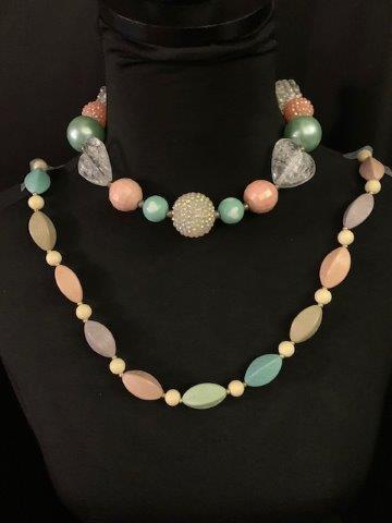 Vintage Bakelite Pairing: Vintage pastel Bakelite pairing of two necklaces measuring 14 to 32 inches in length