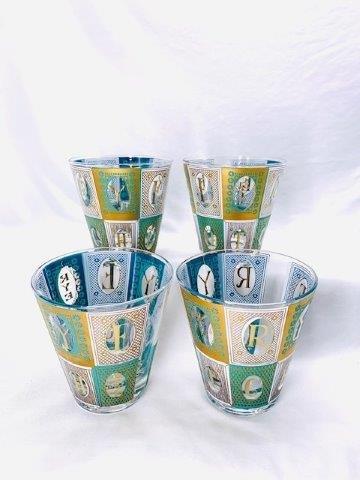 George's Briard Rock's Glasses: Beautiful set of four George's Briard rocks glasses teal with 22 karat gold trim. These are in excellent condition standing at 4.5 inches tall.
