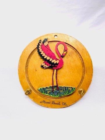 Vintage Flamingo Key Hook: Wall mountable Flamingo key hook from Miami measuring 4 3/4 inches in diameter.