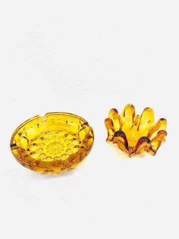 Trio of Vintage Amber Glass Ashtrays: Awesome trio of mid century glassware. Largest 6 3/4 inches in diameter.