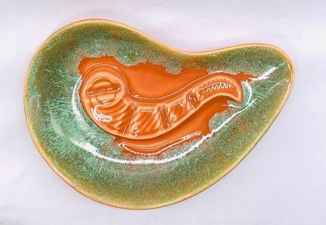 Vintage California Pottery Ashtray: Unique atomic era shape on this California Pottery vintage ashtray measuring 9 1/2 x 7.