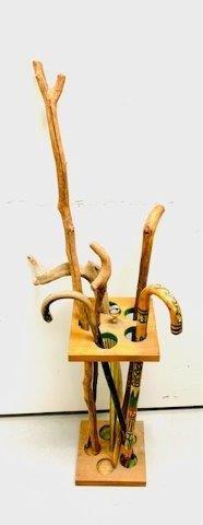 Vintage Cane and Walking stick Collection: Vintage cane and Walking stick collection includes six vintage canes and walking sticks as well as wooden and metal Walking stick stand. Stan measures 26 1/2 inches in height and canes vary in design