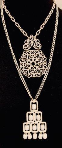 Vintage White Metal Necklaces: Unique coated/painted white metal necklace pairing, one signed Monet. Some wear in places to paint on the other.