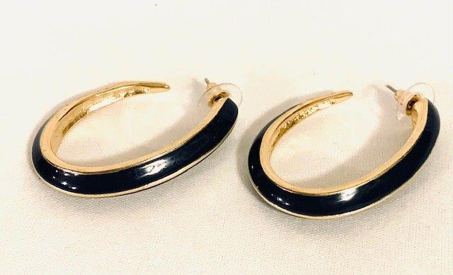 Vintage Signed Trifari Enamel and Goldtone Hoops: Simple yet sophisticated, these gold tone and navy blue signed Trifari earrings measure 1 3/4 inch in length.