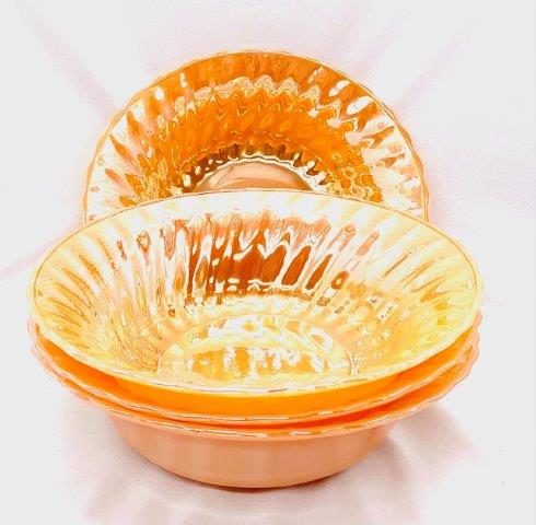 Set of Four Fire King Peach Luster Bowls: Vibrant color with scalloped edge, measuring 8.5 inches in diameter.