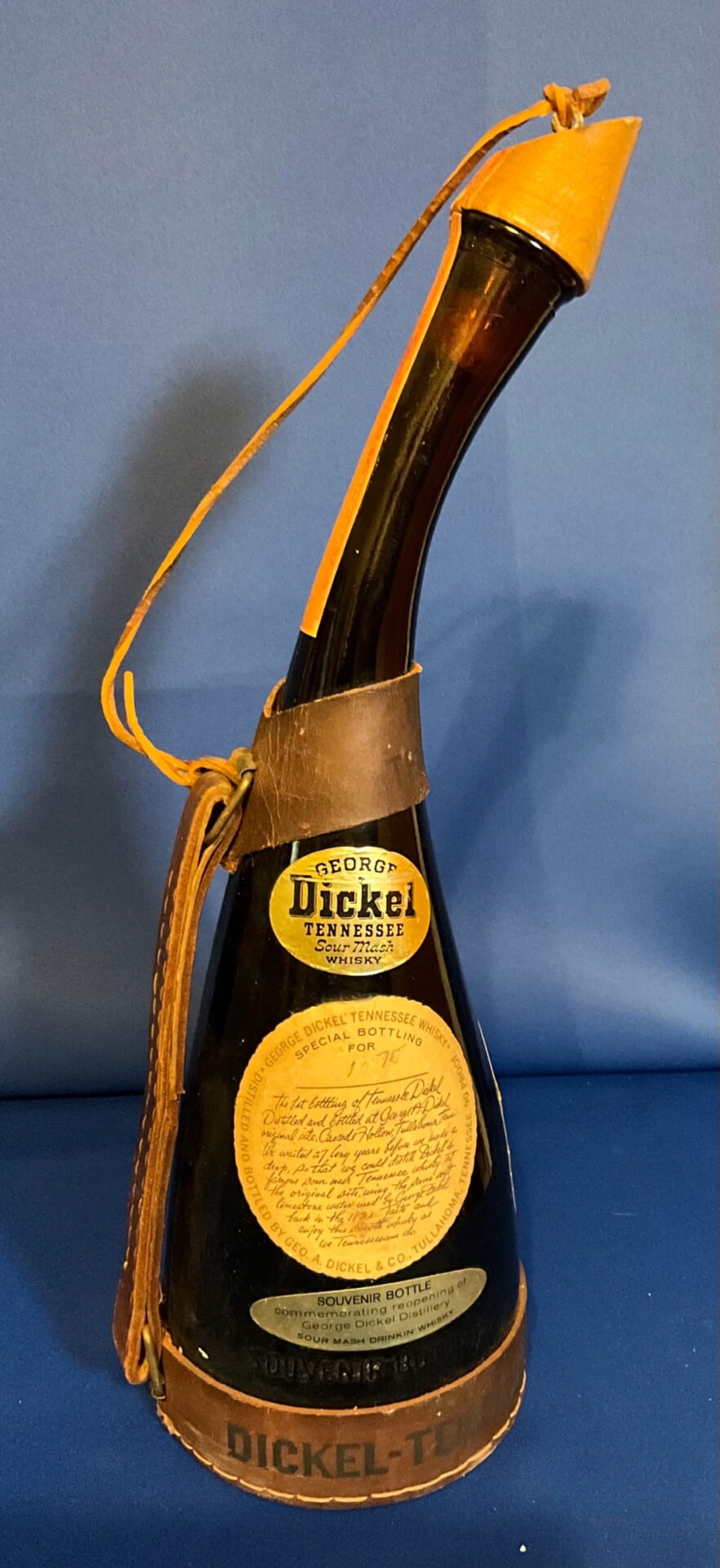 George Dickel Tennessee Sour Mash Whisky Souvenir Glass Bottle in a Leather Holder: George Dickel Tennessee Sour Mash Whisky Souvenir Glass Bottle in a Leather Holder with the Old Liquior Tax Sticker