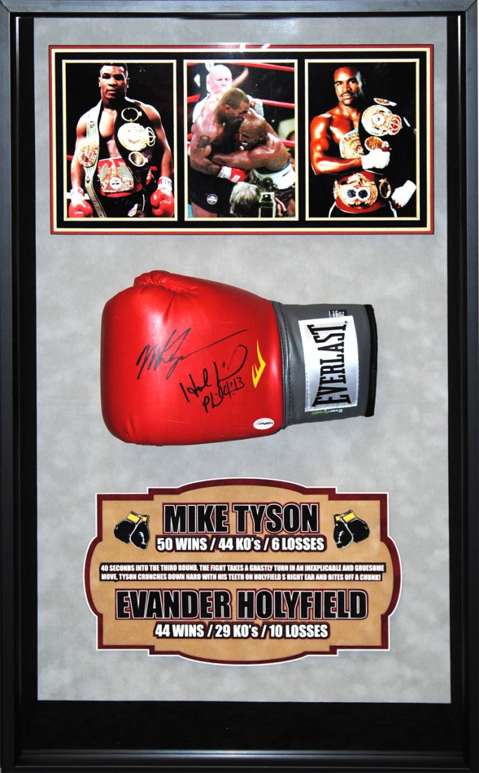 Mike Tyson/Holyfield signed glove: This is a signed glove by two of the greatest boxers ever. It is PSA DNA authenticated . The approximate size is 20 by 26"