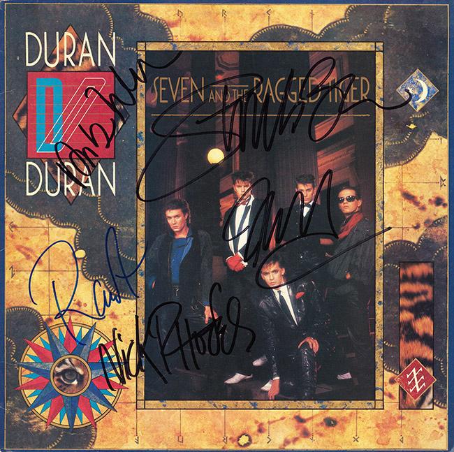 Duran Duran Band signed Seven and the Ragged Tiger: Signed by Simon Le Bon, Andy Taylor, John Taylor, Nick Rhodes, and Roger Taylor. This item comes with a third party COA. This item comes with a Certificate of Authenticity from a third party authentic