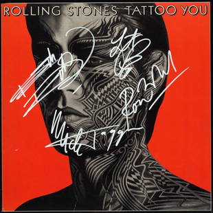 The Rolling Stones Tattoo signed Album: Signed by Mick Jagger, Keith Richards, Ronnie Wood, and Charlie Watts .This item comes with a Certificate of Authenticity from a third party authenticator. This Certification of Authenticity does not