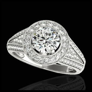 1.70 ctw H-SI/I Diamond Solitaire Halo Ring 10K White: 1.70 ctw H-SI/I Diamond Solitaire Halo Ring 10K White Gold Designer Brand Luxury Jewelry, made in the USA Suggested Retail Price: $16,500 Factory offers perfect factory sizing, for all rings &