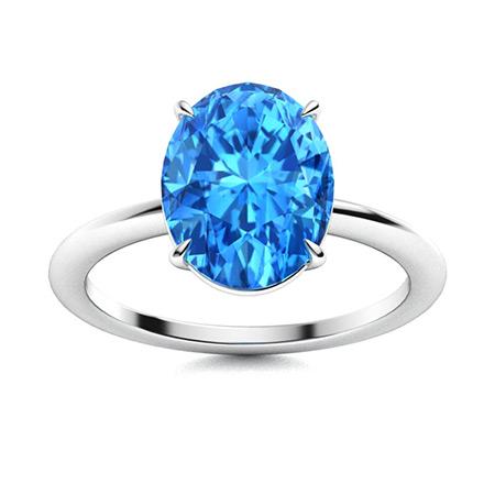 Natural 3.09 CTW Topaz Solitaire Ring 14K White Gold: Natural 3.09 CTW Topaz Solitaire Ring 14K White Gold Manufacturer's Suggested Retail Price: $1800.00 Center Stone: 1 Topaz @ 3.09 ctw Center Stone Color: Blue Center Stone Clarity: AAAA Center Stone S