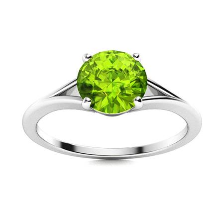 Natural 0.72 CTW Peridot Solitaire Ring 18K White Gold: Natural 0.72 CTW Peridot Solitaire Ring 18K White Gold Manufacturer's Suggested Retail Price: $1440.00 Center Stone: 1 Peridot @ 0.72 ctw Center Stone Color: Green Center Stone Clarity: AAAA Center St