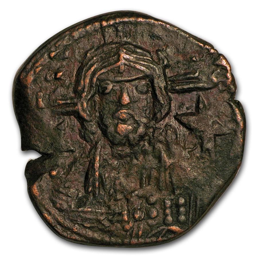 Anonymous Byzantine Follis Christ Bust (976-1081 AD): One piece Anonymous Byzantine Follis Christ Bust (976-1081 AD) VF-XF The anonymous Follis coinage is one of the more interesting series in Byzantine coinage. John I Tzimisces was the first Byzantine e