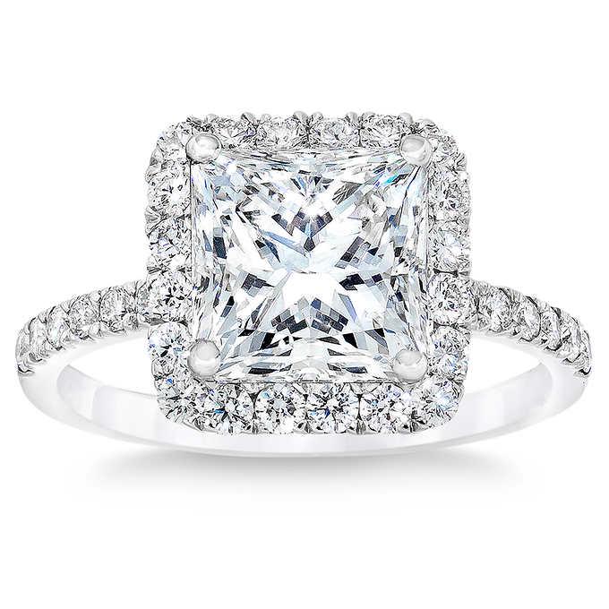 Natural 2.53 CT Diamond Bridal Ring 18K White Gold: Natural 2.53 CT Diamond Bridal Ring 18K White Gold Manufacturer's Suggested Retail Price: $37000.00 Centerstone : 1 Princess Cut Diamond @ 2 CT Centerstone Clarity: VS2 Centerstone Color: I Stone 2: 3