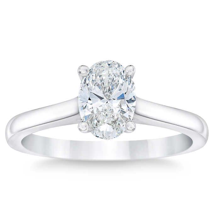 Natural 1 CT Diamond Solitaire Ring 14K White Gold: Natural 1 CT Diamond Solitaire Ring 14K White Gold Manufacturer's Suggested Retail Price: $8700.00 Centerstone : 1 Oval Cut Diamond @ 1 CT Centerstone Clarity: SI2 Centerstone Color: J Metal Type: 14K
