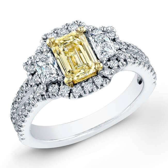 Natural 1.82 CTW Canary Yellow Emerald Cut Diamond Ring: Natural 1.82 CTW Canary Yellow Emerald Cut Diamond Ring 18KT White Gold Manufacturer's Suggested Retail Price: $ 13200.00 Center Stone Type: Diamond Center Stone QTY: 1 Center Stone CTW: 0.72 Center S