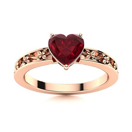 Natural 0.64 CTW Ruby Solitaire Ring 18K Rose Gold: Natural 0.64 CTW Ruby Solitaire Ring 18K Rose Gold Manufacturer's Suggested Retail Price: $3510.00 Center Stone: 1 Ruby @ 0.64 ctw Center Stone Color: Red Center Stone Clarity: AAAA Center Stone Shape