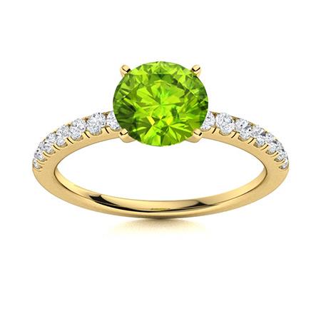 Natural 1.46 CTW Peridot & Diamond Engagement Ring 14K: Natural 1.46 CTW Peridot & Diamond Engagement Ring 14K Yellow Gold Manufacturer's Suggested Retail Price: $2580.00 Center Stone: 1 Peridot @ 1.21 ctw Center Stone Color: Green Center Stone Clarity: AA
